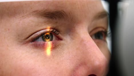 Female-patient-undergoing-eye-examination-on-slit-lamp