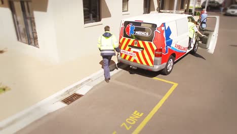 Hospital-staff-getting-into-the-ambulance