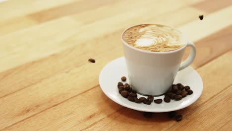 Nahaufnahme-Einer-Kaffeetasse-Mit-Untertasse-Und-Kaffeebohnen