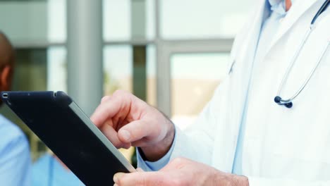 Doctor-using-a-digital-tablet-in-hospital