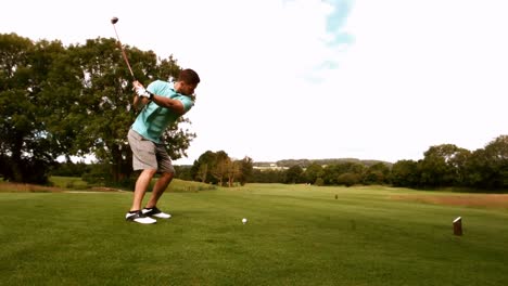 Rear-view-of-man-playing-golf
