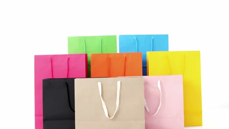 Multicolored-shopping-bags-on-white-background