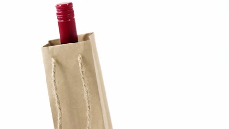 Close-up-bottle-in-paper-bag