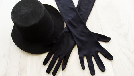 Bowler-hat-and-black-gloves-in-dance-studio