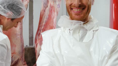 Butcher-standing-with-arms-crossed
