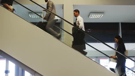 Business-people-walking-up-the-stairs