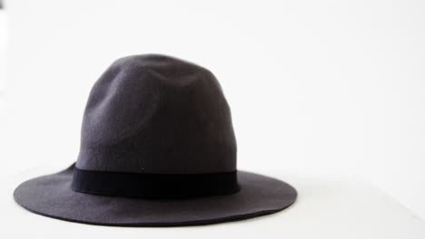 Black-hat-against-white-background