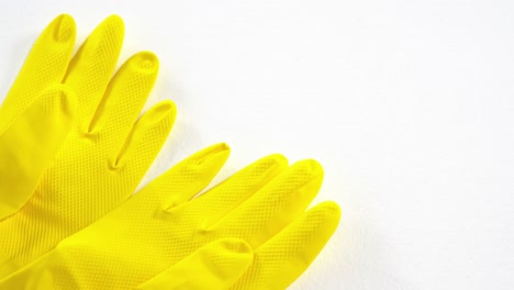 Close-up-of-yellow-gloves