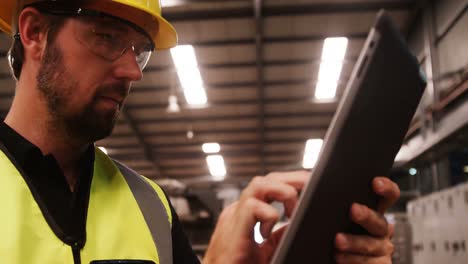 Worker-using-digital-tablet