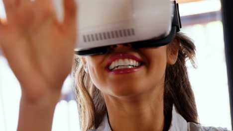 Woman-using-virtual-reality-headset-