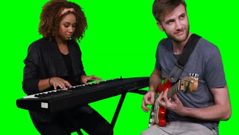 Musicians-playing-piano-and-guitar