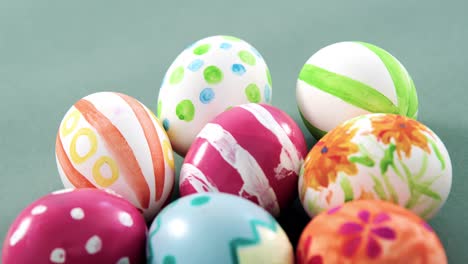 Multicolored-Easter-eggs-on-grey-background