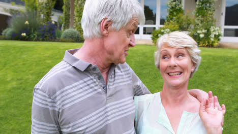Senior-couple-interacting-with-each-other-in-garden