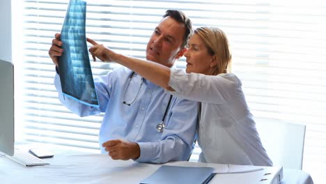 Doctor-discussing-a-x-ray-report-with-patient