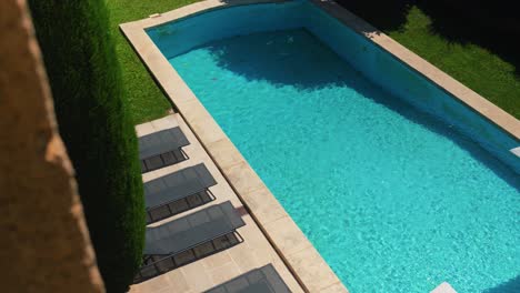 Revealing-shot-of-heated-private-swimming-pool-in-private-villa