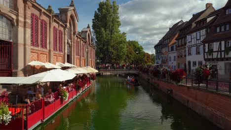 People-Sail-in-a-Boat-near-Covered-Market-in-Fishmongers-district-in-Colmar