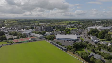 Aerial-shot-of-Claremorris,-featuring-the-Soccer-Astro-Pitch-and-Saint-Colman's-Church