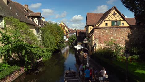 People-Walk-in-Fishmongers-district-in-Colmar-on-a-Sunny-Day