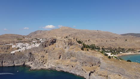 Rotating-drone-shot-of-the-Acropolis-of-Lindos-on-the-island-of-Rhodes,-Greece