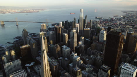Aerial-pull-back-shot-of-the-San-Francisco-city-center-on-a-colorful-evening