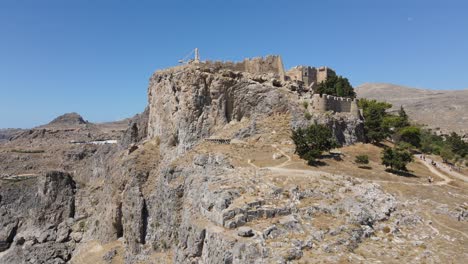 Rising-drone-shot-of-the-Acropolis-of-Lindos-on-the-island-of-Rhodes