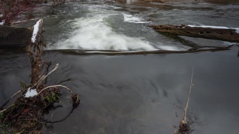 Time-lapse-tilt-of-flowing-water-stream-Credit-River-Caledon-Lake-Ontario-Canada-conservation-environment-travel-tourism-recreation-North-America