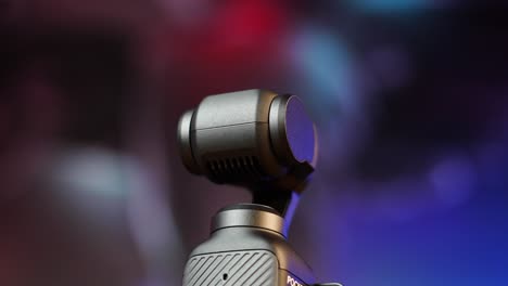 Close-up-of-small-pocket-size-electronic-camera-with-gimbal-stabilization