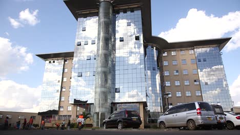 Modern-office-building-in-Nairobi,-Kenya.-Low-angle