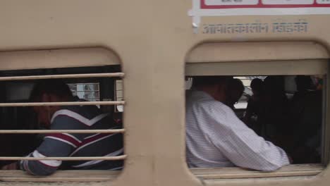 Full-to-capacity-Indian-train-wagon-arriving-in-station