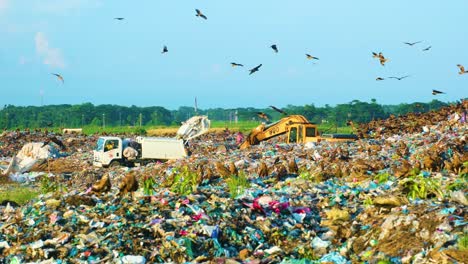 Bangladesh-workers-manage-human-waste-at-landfill,-pollution-concept