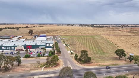 Yarrawonga,-Victoria,-Australia---7-December-2023:-Sideways-aerial-view-of-the-Bunnings-hardware-store-in-Yarrawonga-Australia