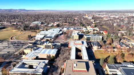 Colorado-State-University-College-campus-drone-flyover-with-university-buildings-in-Fort-Collins,-Colorado,-USA