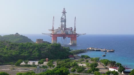 Orbit-around-off-shore-oil-rig-on-coastal-waters-of-Caribbean
