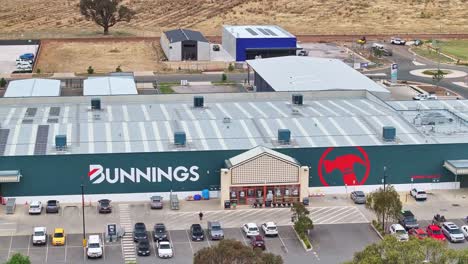 Yarrawonga,-Victoria,-Australia---7-December-2023:-Close-Up-aerial-sideways-view-of-the-Yarrawonga-Bunnings-hardware-store-and-carpark