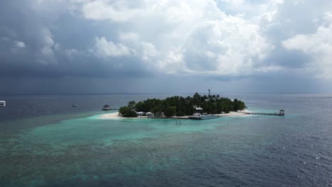 Aerial-view-of-Bathalaa-island-and-honeymoon-resort,-Maldives,-Indian-Ocean
