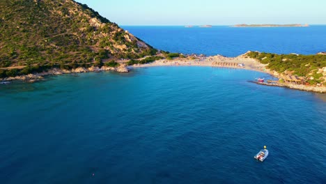 flying-over-turquoise-water-of-Punta-Molentis-Beach,-Villasimius,-Sardinia,-Italy