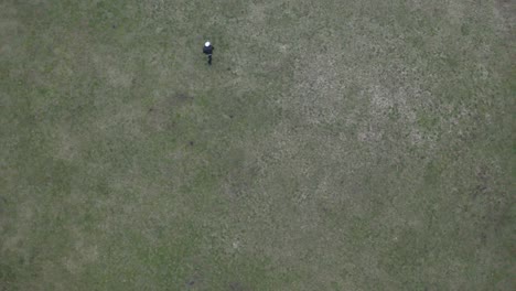 Cinematic-4K-Aerial-shot-of-people-playing-Frisbee-in-a-park