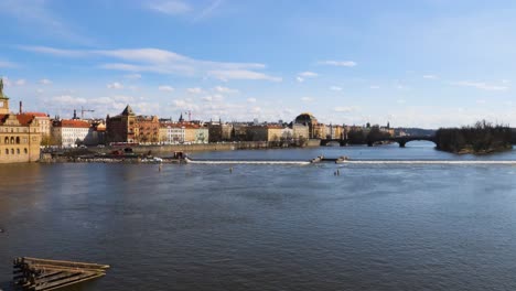 View-of-the-Vltava-river-and-Střelecký-Island-from-the-Charles-Bridge,-Prague,-Czech-Republic