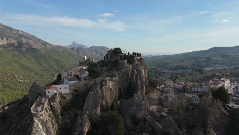 A-drone-orbiting-the-Castle-of-Guadalest-in-Alicante,-Spain