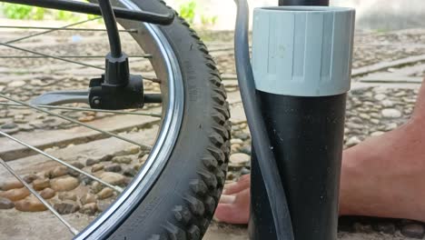 close-up-inflating-a-bicycle-tire