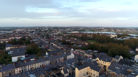 Slow-panning-drone-shot-during-sunset-over-Galway,-Ireland