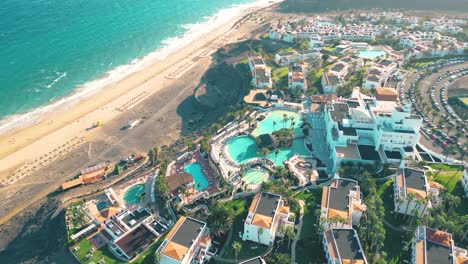 Aerial-view-of-a-luxury-hotel-along-the-coast-Club-JandĂ­a-Princess,-Canary-Islands,-Spain