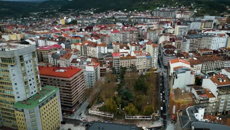 San-lazaro-park-in-middle-of-Ourense-Spain,-urban-green-space-by-apartment-buildings