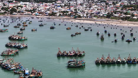 Vietnamese-big-trawlers-and-fisherman-boats,-aerial-drone-view