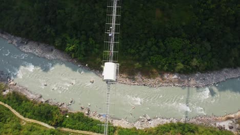 Spectacular-aerial-high-above-Kushma-suspension-bridge-bungee-jump