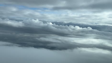 A-pilot’s-perspective-while-flying-through-a-dramatic-winter-sky-during-a-left-turn