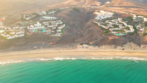 Aerial-view-of-a-luxury-hotel-along-the-coast-Hotel-Robinson-Hotel-Fuerteventura,-Canary-Islands,-Spain