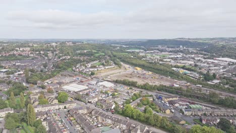Aerial-drone-lifting-shot-over-a-densely-populated-neighborhood-in-Huddersfield-in-the-UK