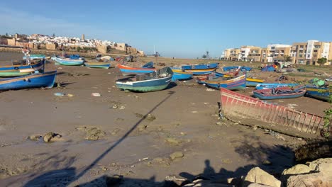 Rustic-wooden-boats-moored-on-the-sand-on-Rabat-Bou-Regreg-riverbanks