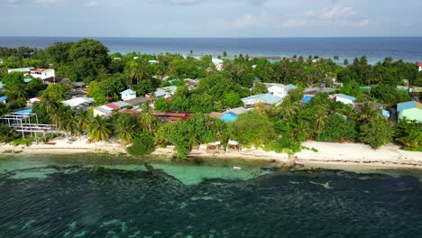 Aerial-view-of-Dhangethi-town,-beach-and-reef